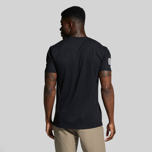 Man wearing a black t-shirt against a plain background