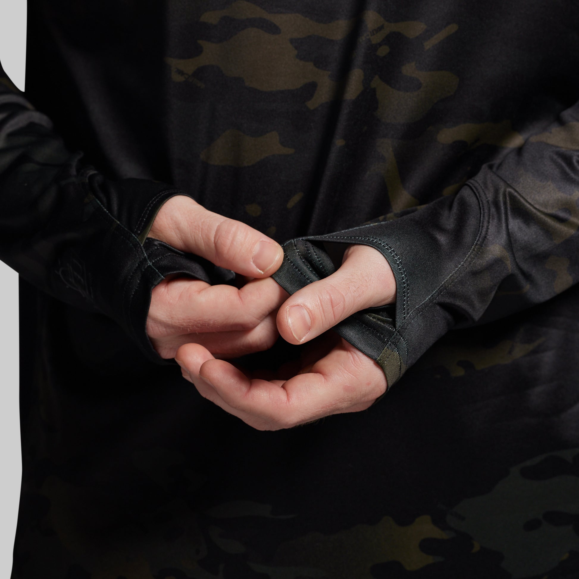 Close-up of long sleeve camouflage shirt with thumbholes