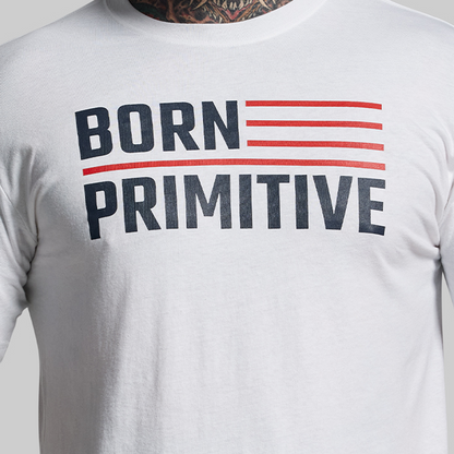 White t-shirt with 'Born Primitive' text design on a plain background