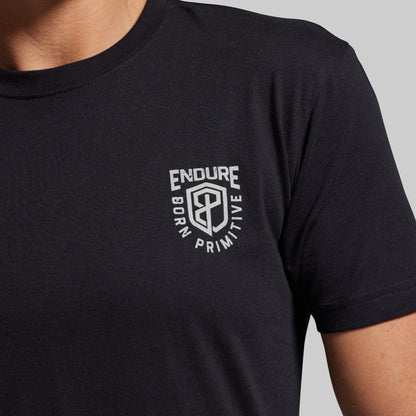Black t-shirt with a white logo on a gray background