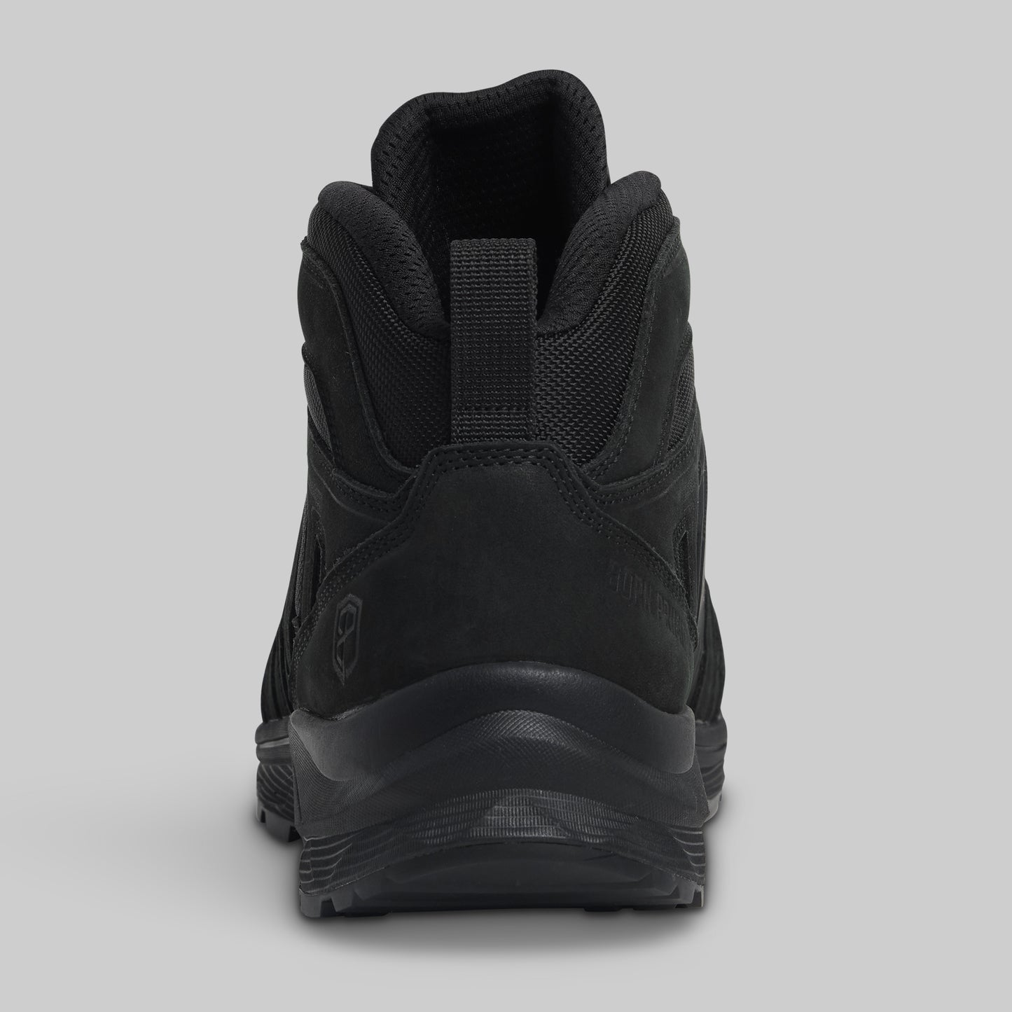 Black boot on a gray background