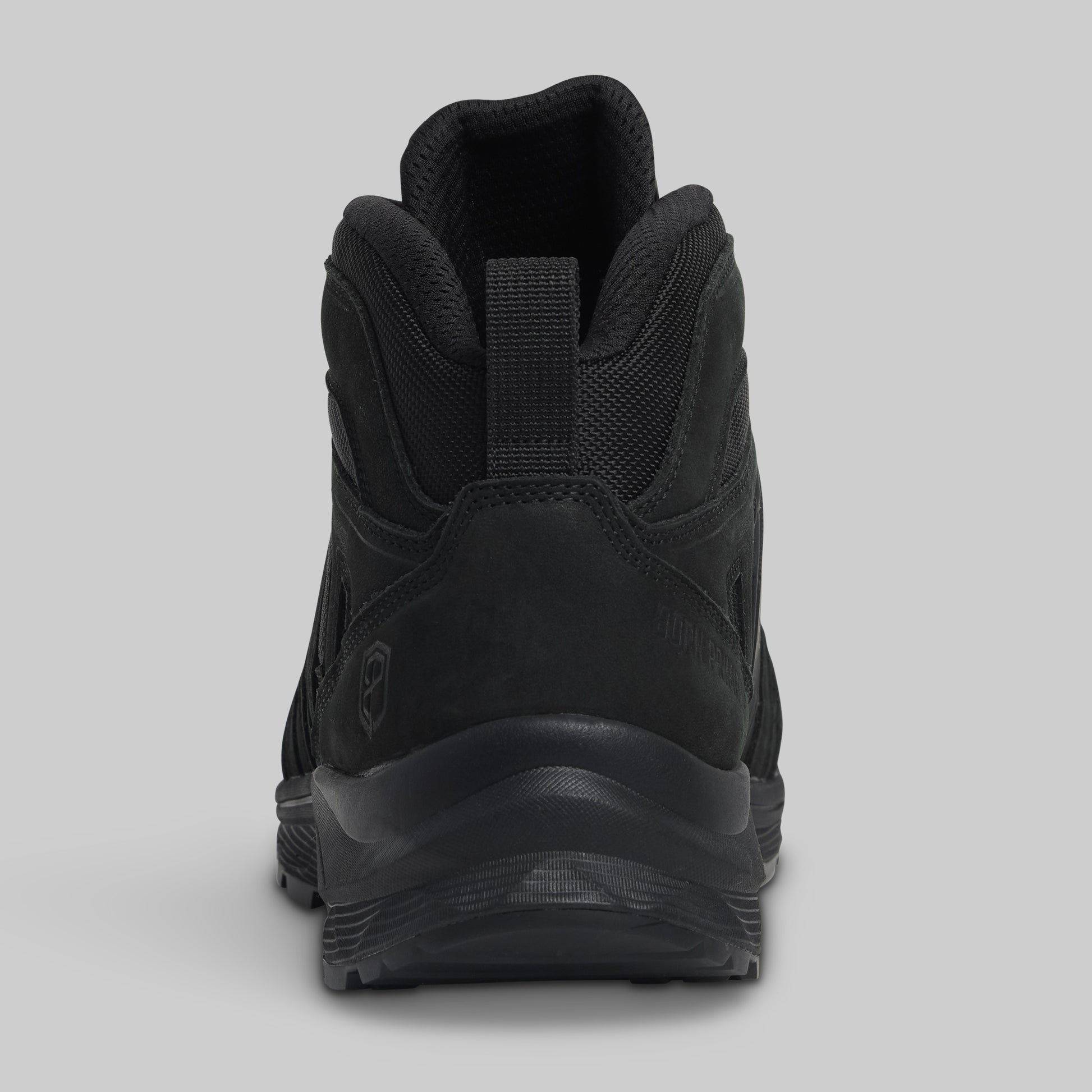 Black boot on a gray background