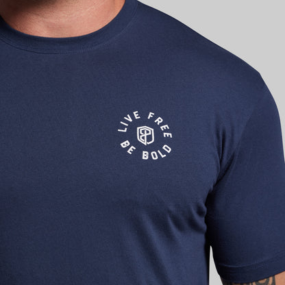 Navy blue t-shirt with a white logo and text on a gray background
