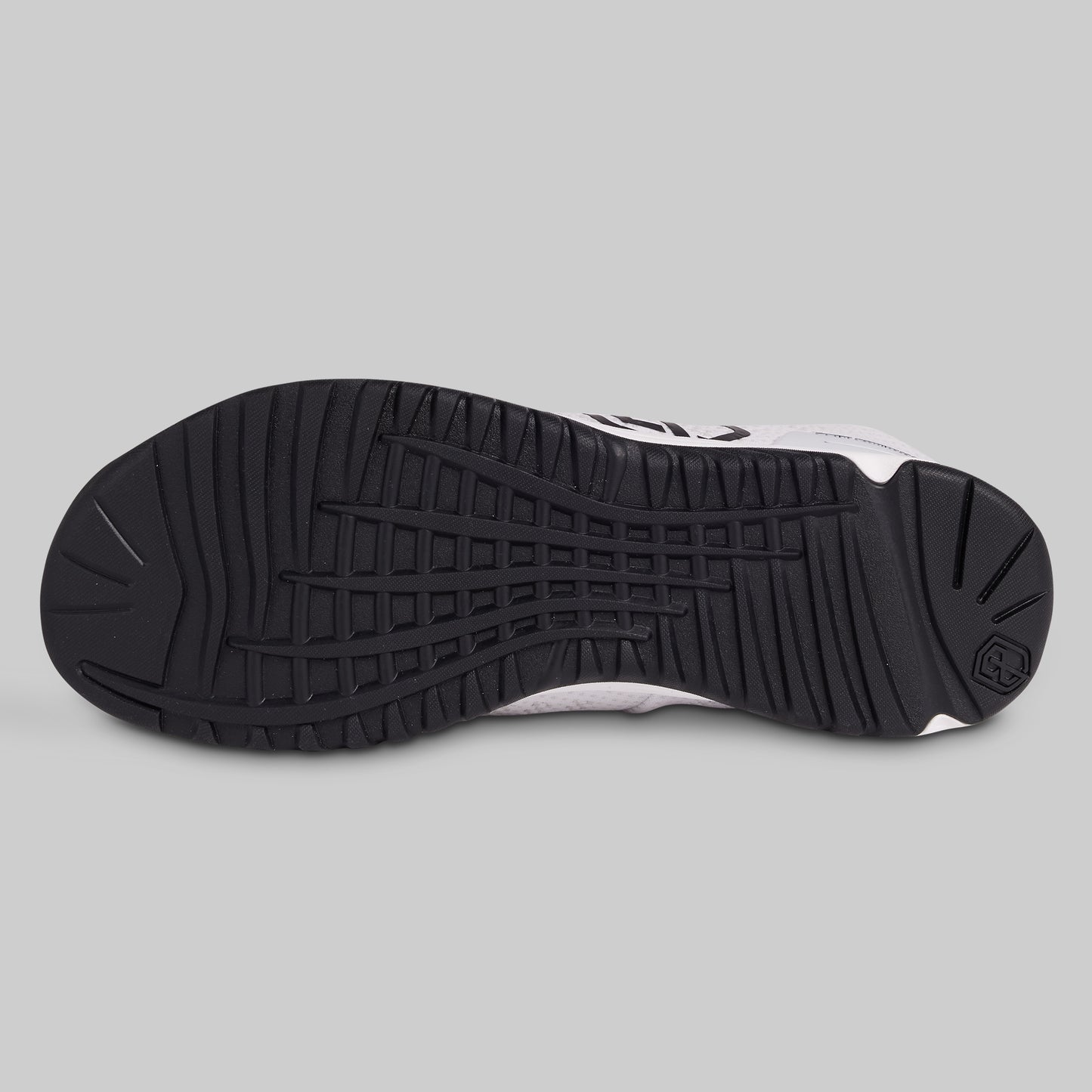 Black and white sneaker sole on a gray background