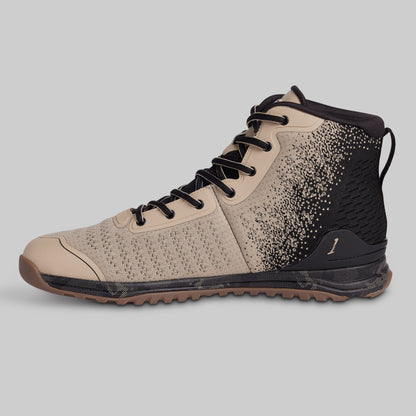 Beige and black high-top sneaker on a gray background