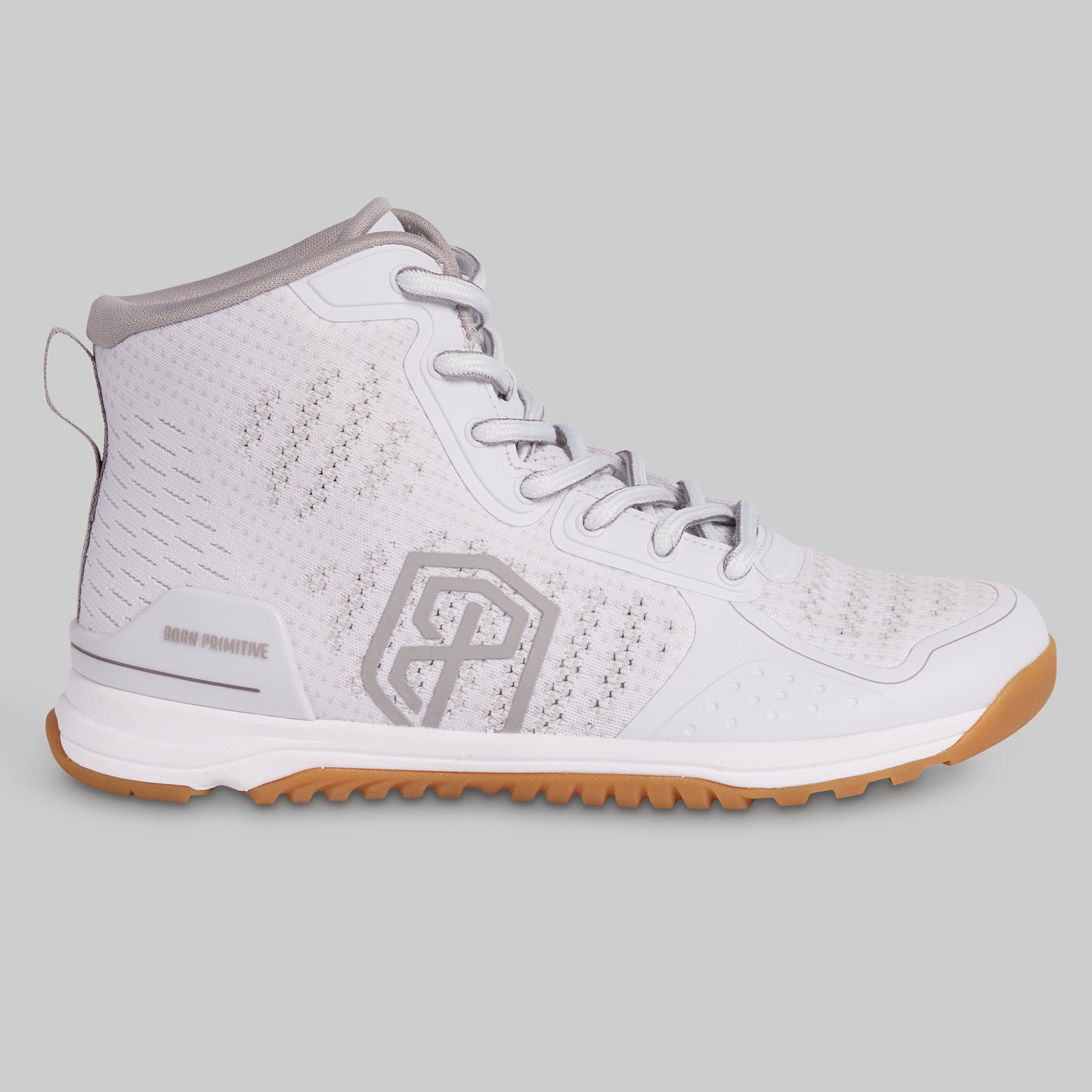 White athletic shoe with gray accents on a light gray background
