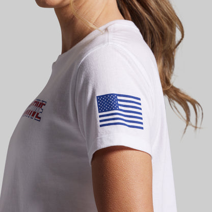 White t-shirt with American flag design on sleeve on a plain background