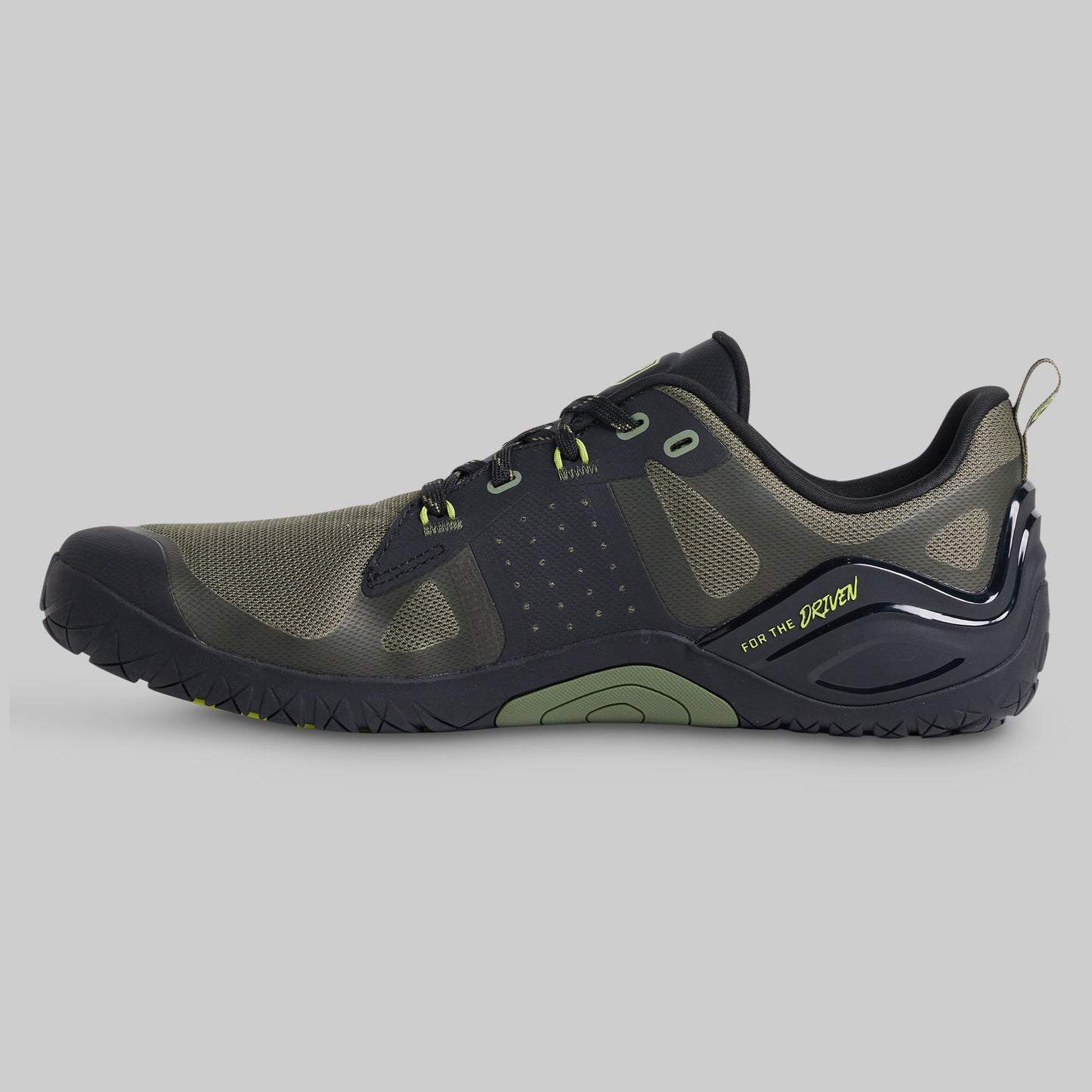 Green and black athletic shoe shown from the side