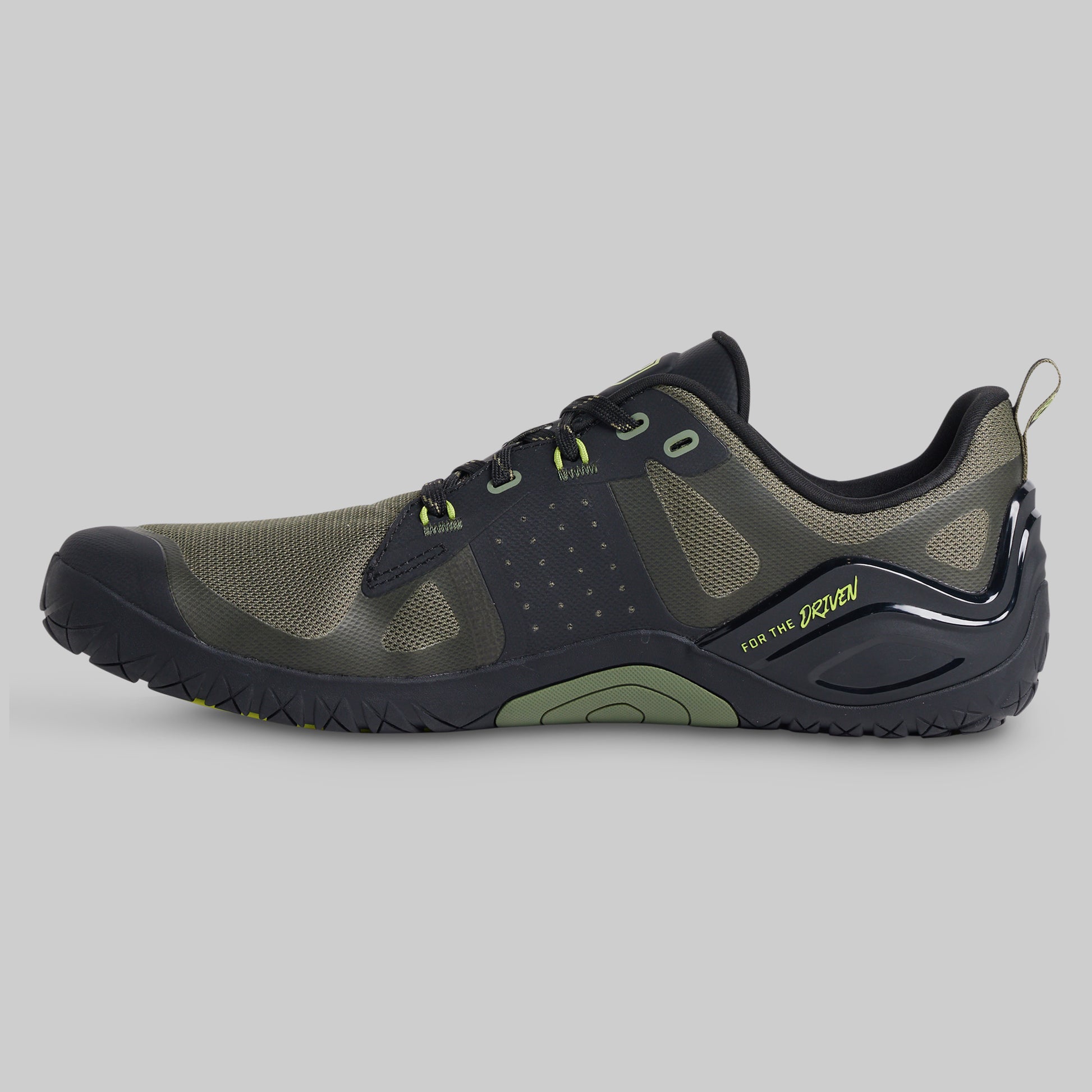 Green and black athletic shoe shown from the side