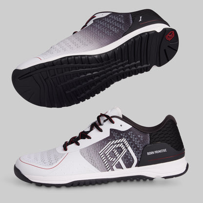White and black athletic shoes with a visible brand logo on a gray background