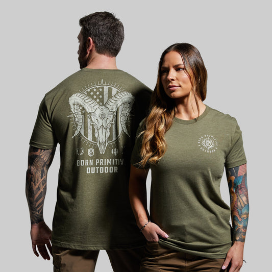 Two people wearing green t-shirts with outdoor-themed designs on a gray background