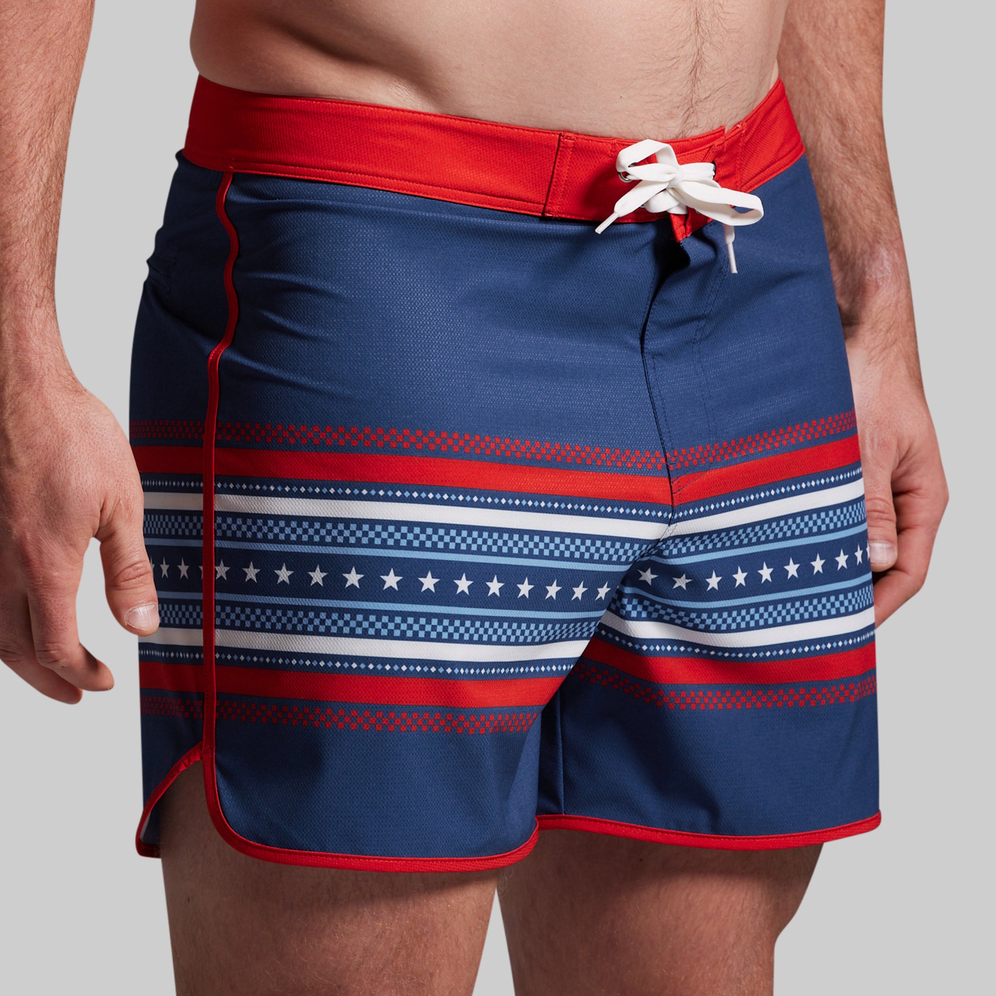 Blue shorts with American flag pattern.