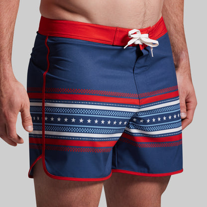 Blue shorts with American flag pattern.