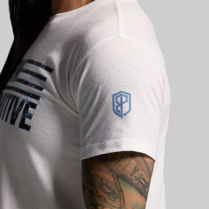 White t-shirt with text and logo on a gray background