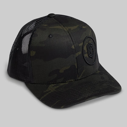 Black camouflage baseball cap with a logo on a gray background
