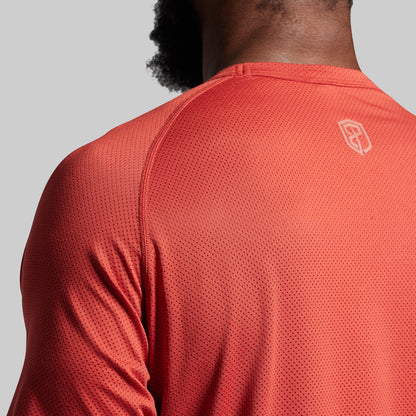 Red athletic shirt with textured back design.