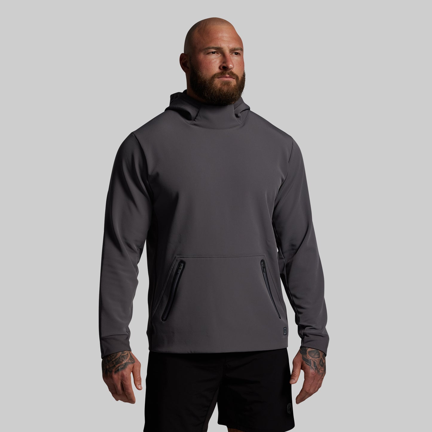 Man wearing a gray hoodie