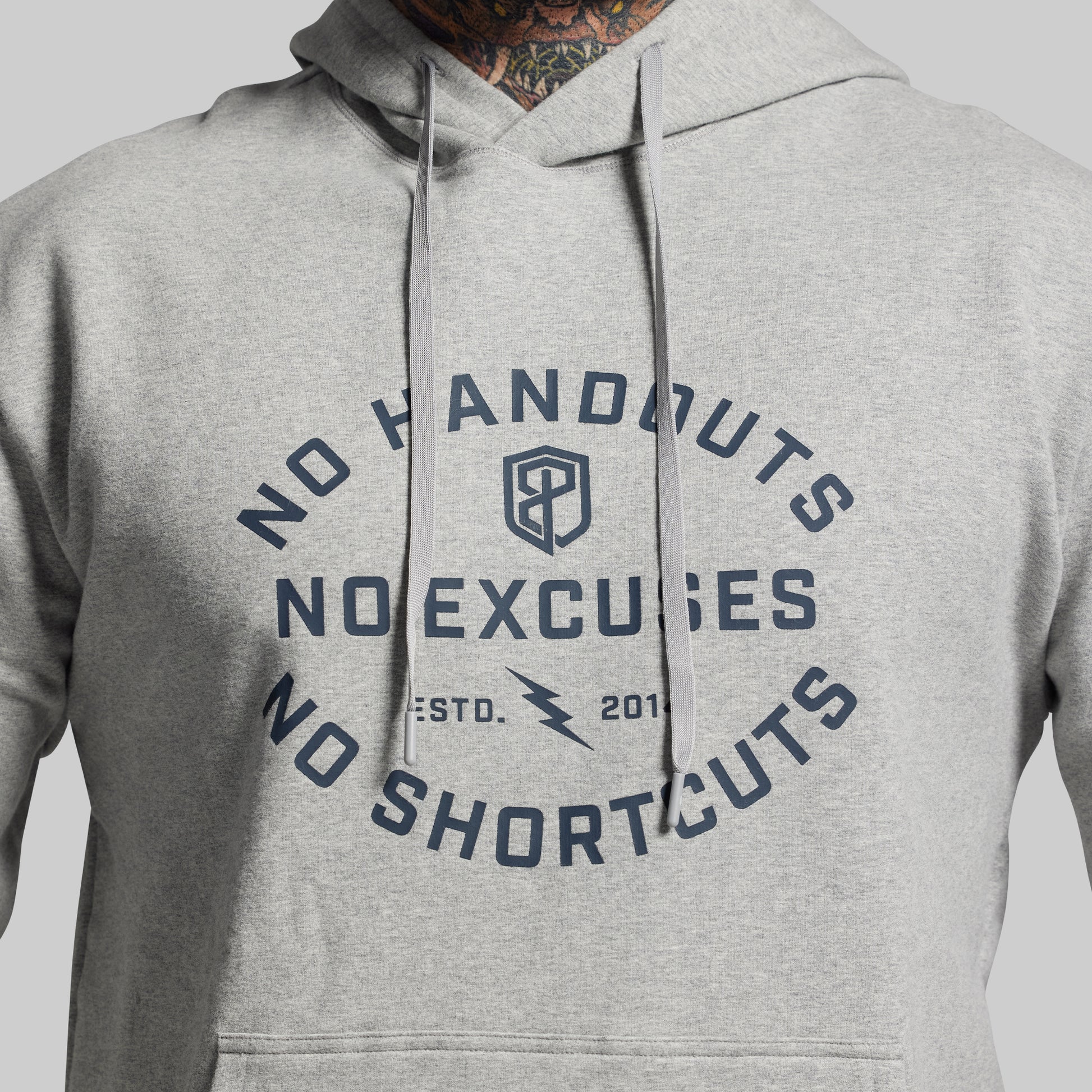 Gray hoodie with motivational text and logo on a plain background