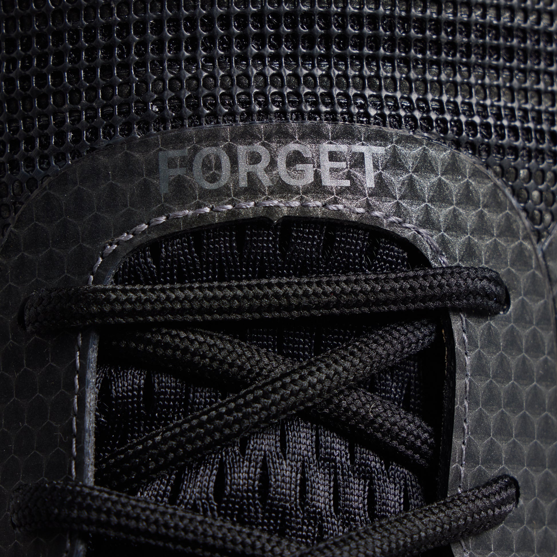 Men's 9/11 Savage 1 training shoe close-up with FORGET top-panel detail