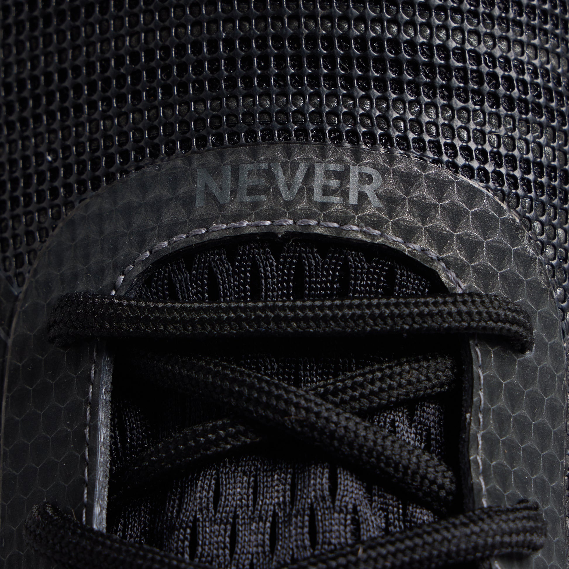 Men's 9/11 Savage 1 training shoe close-up with NEVER hook-and-loop strap detail