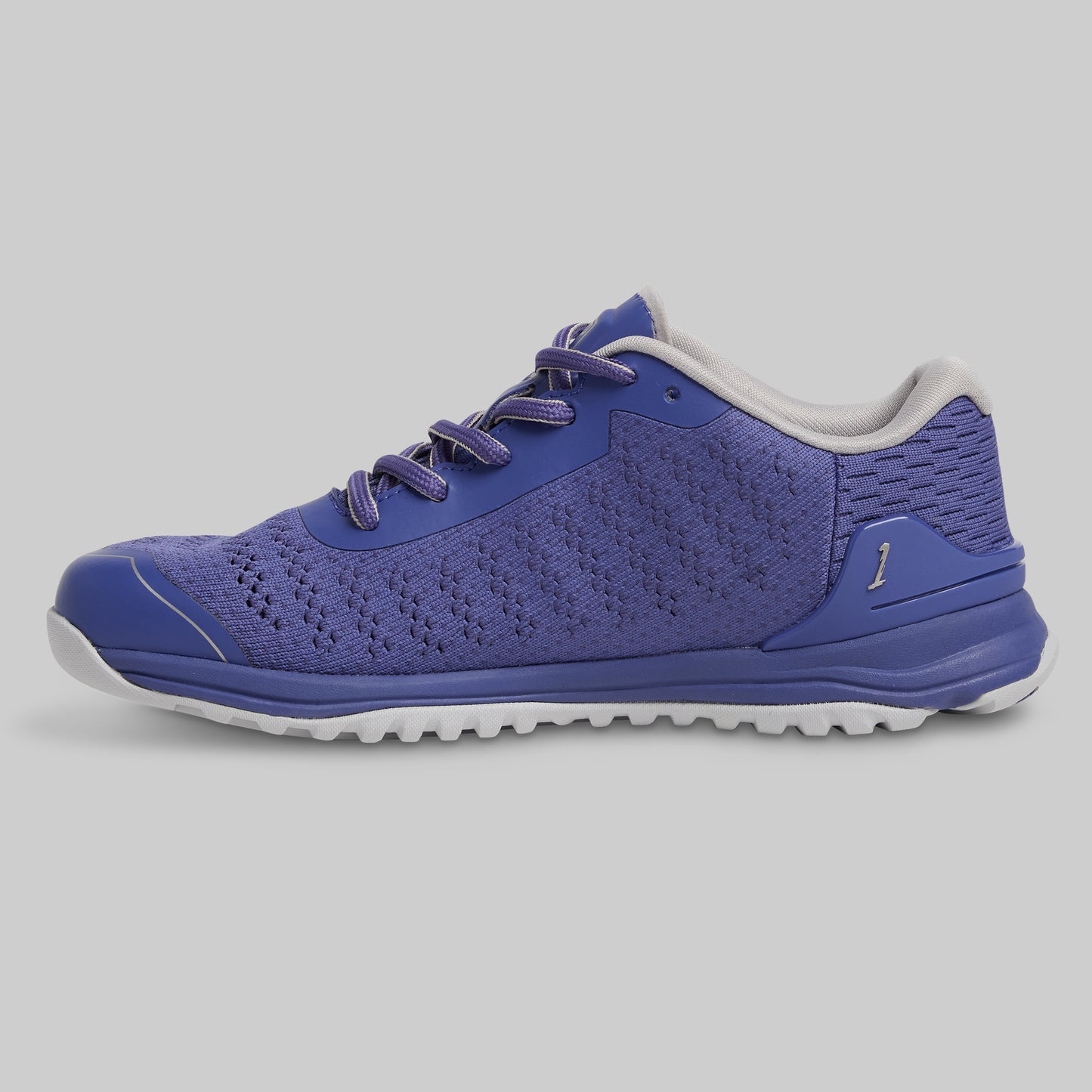 Blue athletic shoe on a gray background