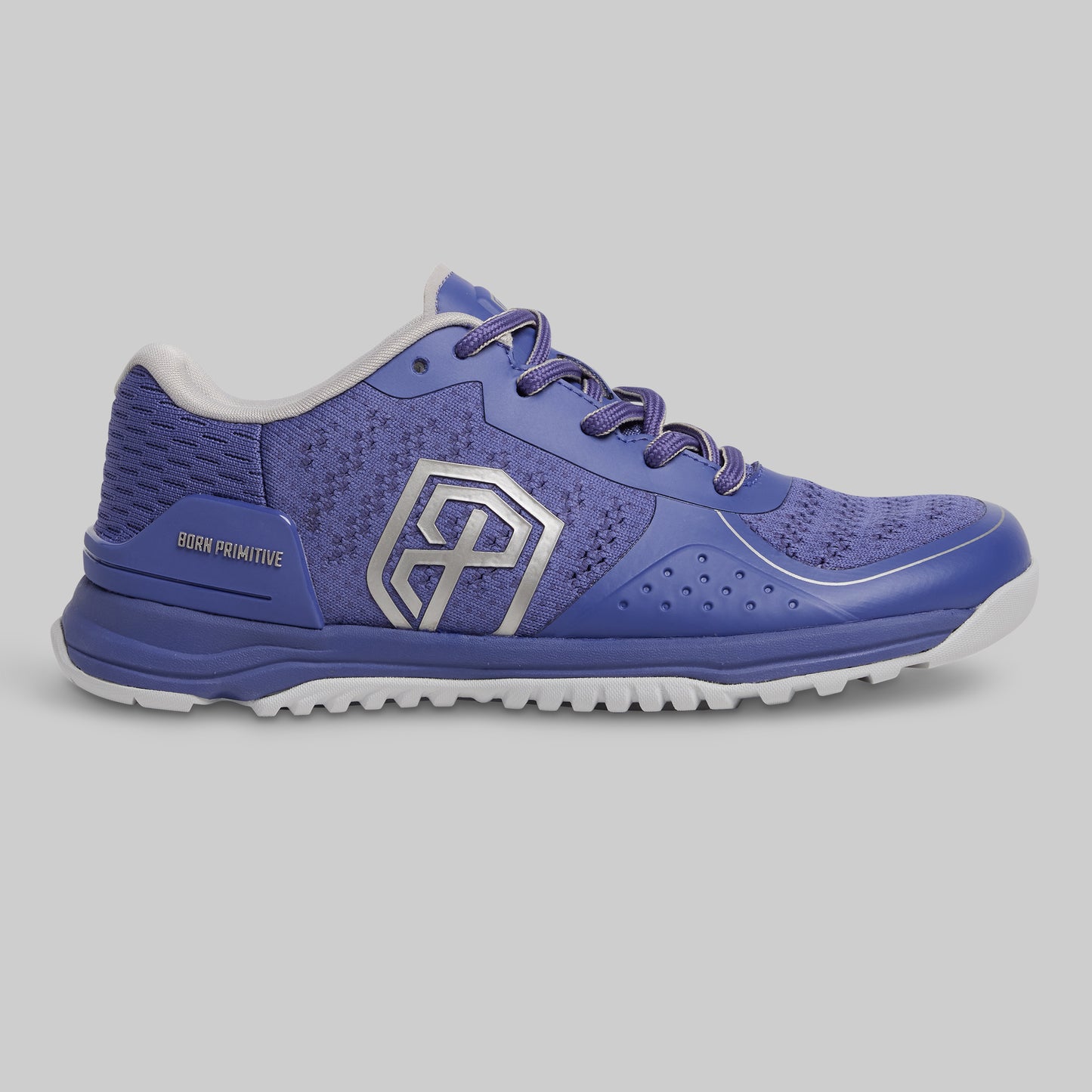 Blue athletic shoe with a white logo on a gray background