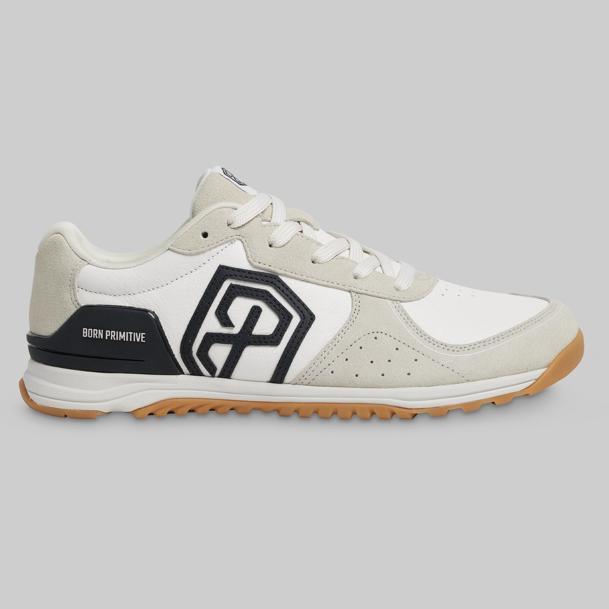 White and gray sneaker with a black logo on a gray background