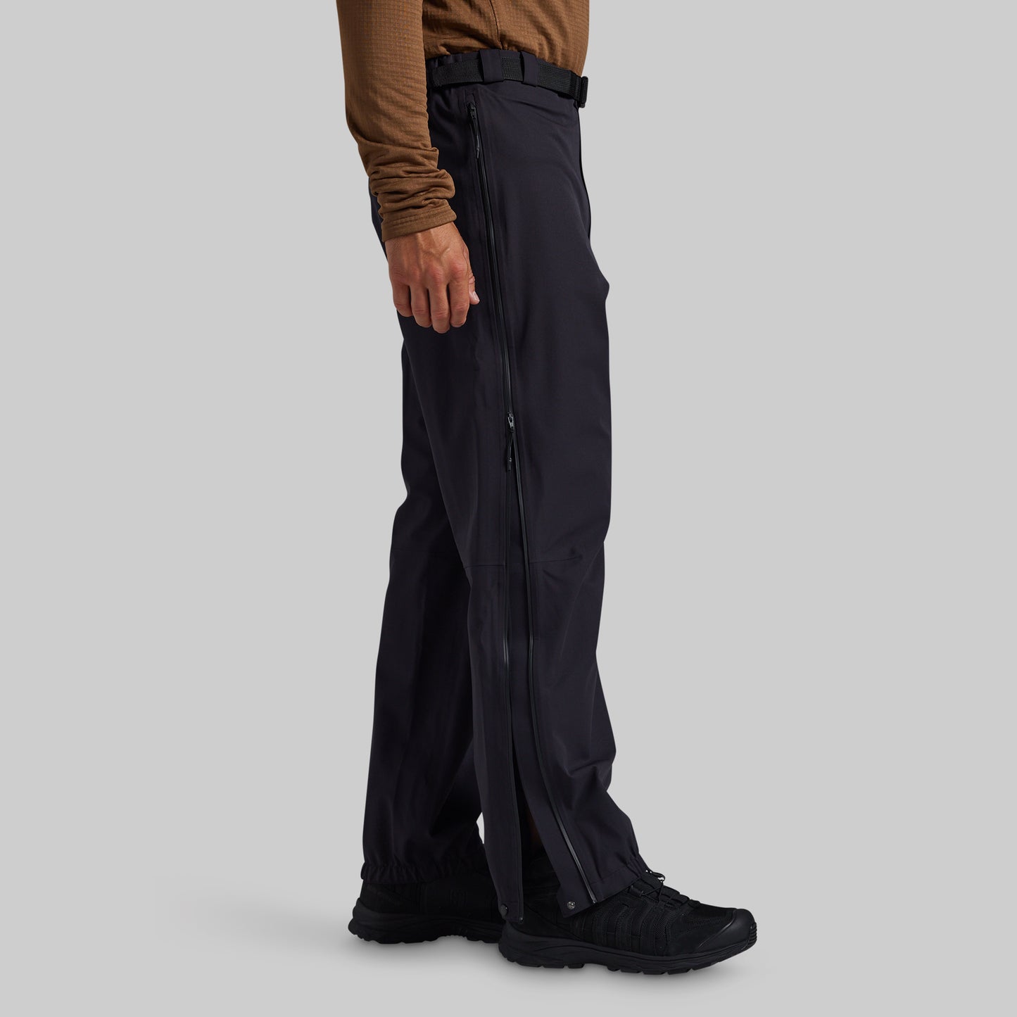 Side view of black Mission FLEX Rain Pant 2.0 with full-length zipper
