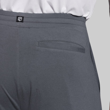 Gray shorts with a pocket detail on a light gray background