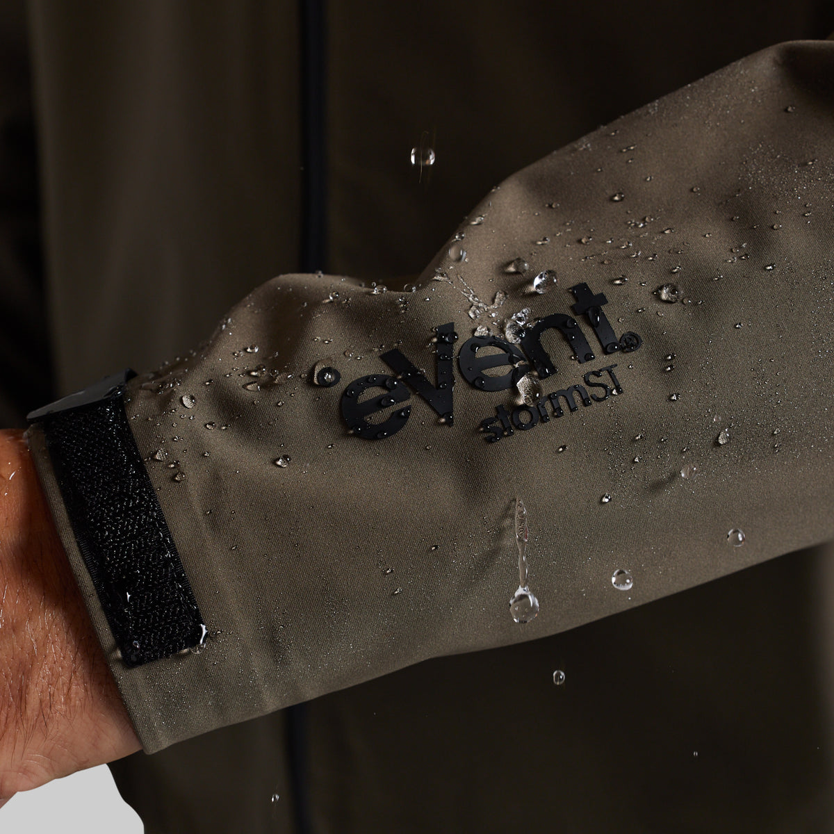 Water beading on the eVent® sleeve of the Ranger Green Mission FLEX Rain Jacket 2.0