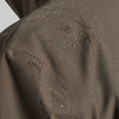 Water beading on the shoulder of the Ranger Green Mission FLEX Rain Jacket 2.0