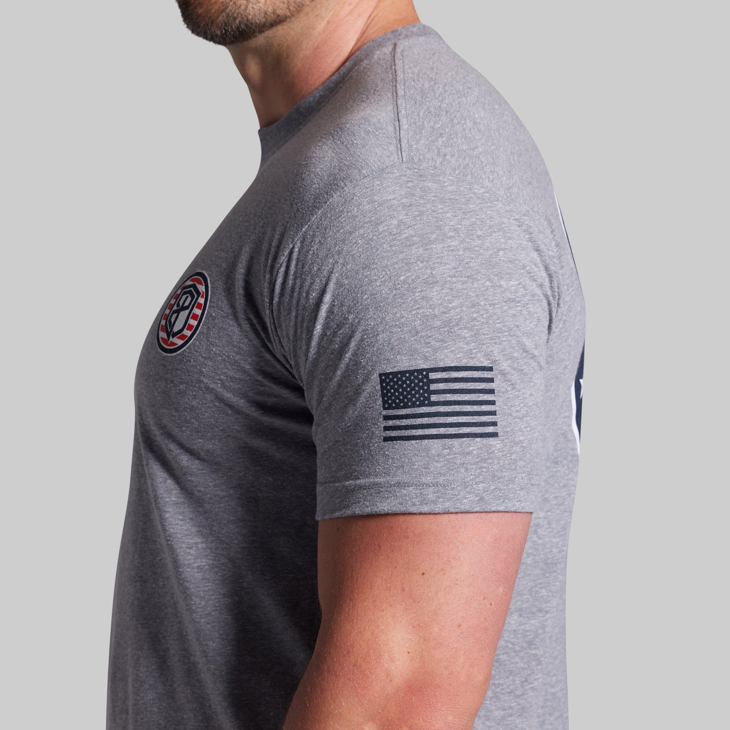 Gray t-shirt with an American flag design on a gray background