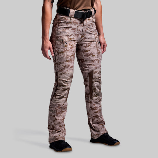 Person wearing camouflage pants on a gray background