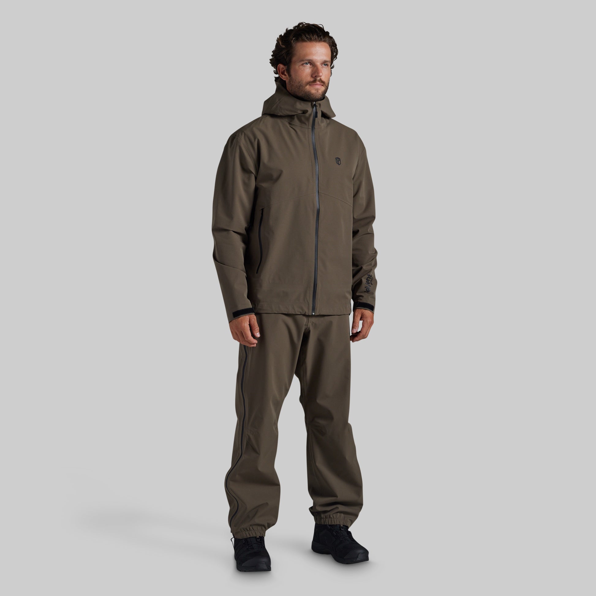 Full front view of Ranger Green Mission FLEX Rain Pant 2.0 with matching rain jacket
