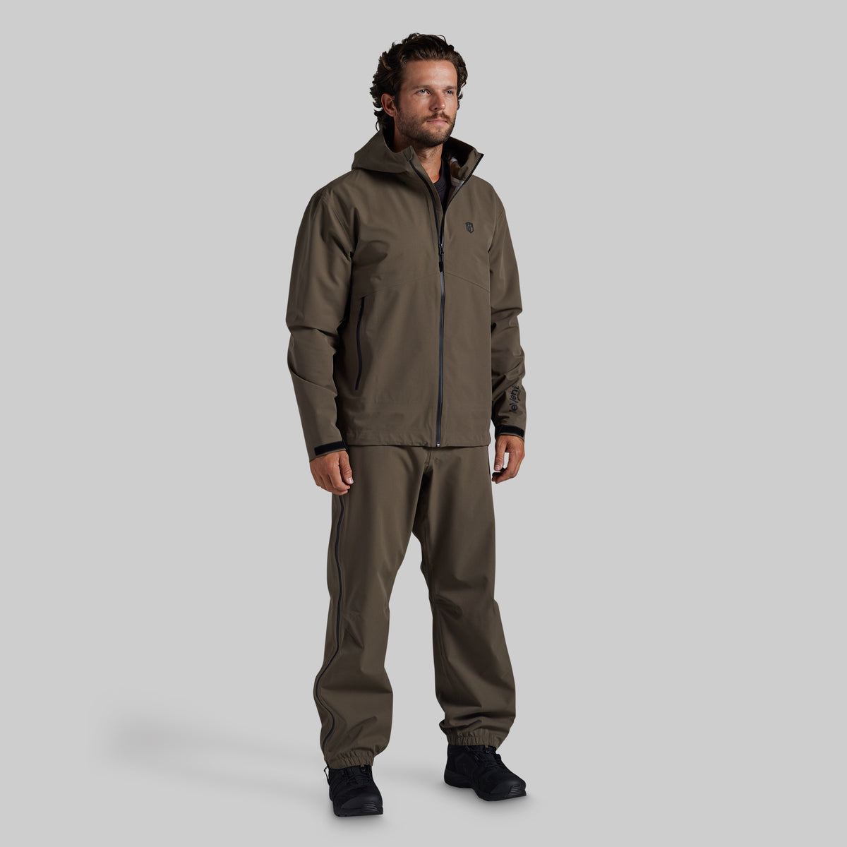 Full front view of the Ranger Green Mission FLEX Rain Jacket 2.0 with matching rain pants
