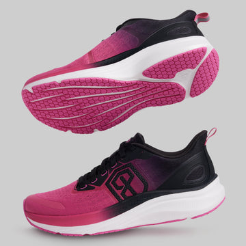 Pink and black running shoes on a gray background