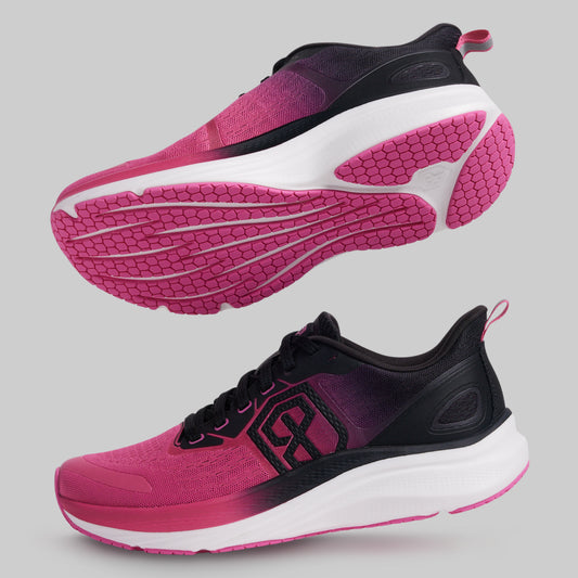 Pink and black running shoes on a gray background