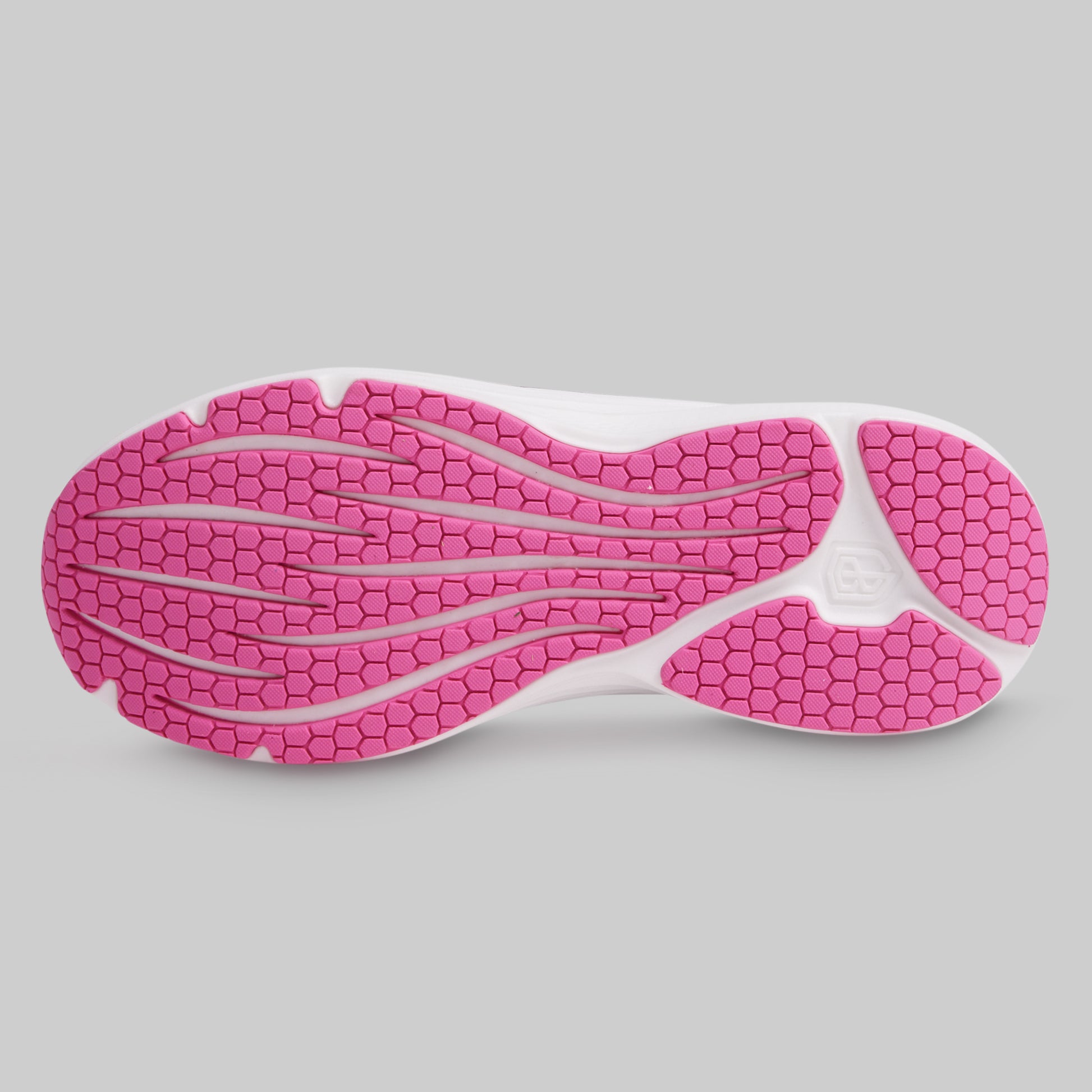Close-up of a shoe sole with pink tread pattern on a gray background