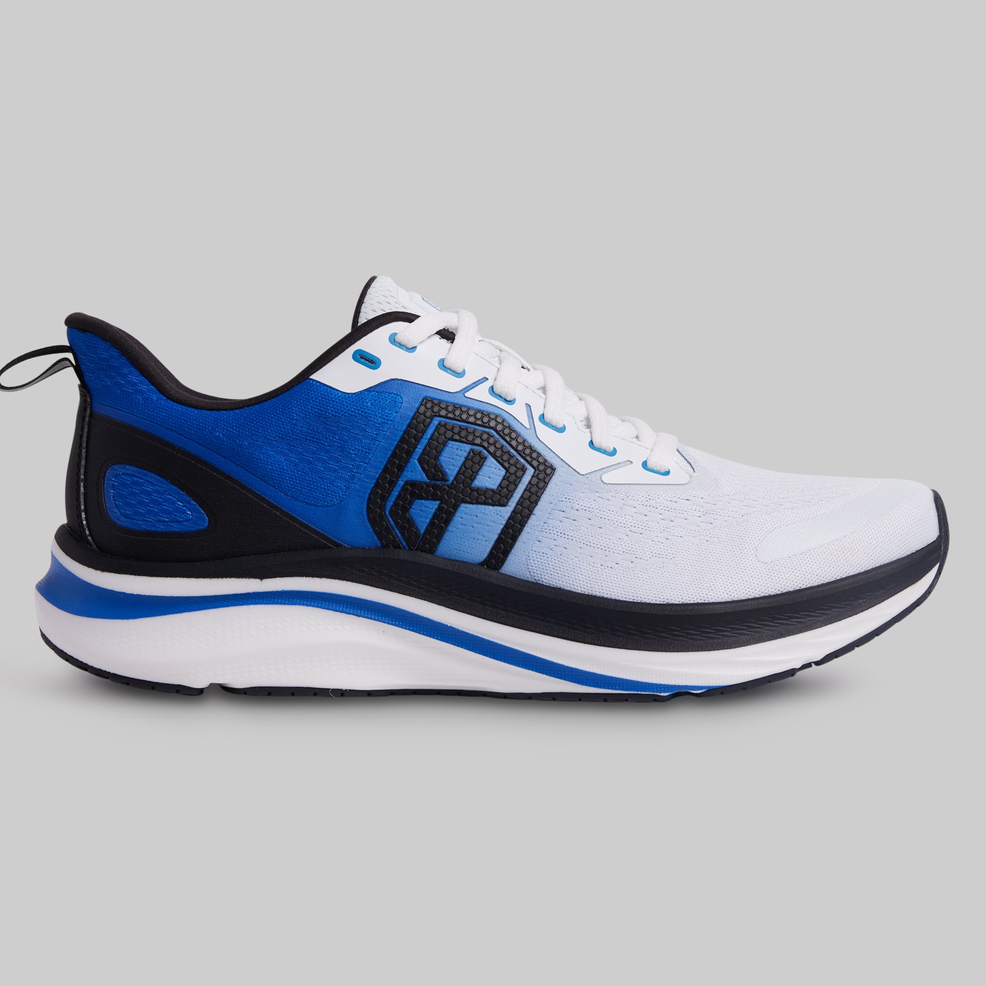 White, blue, and black running shoe on a gray background