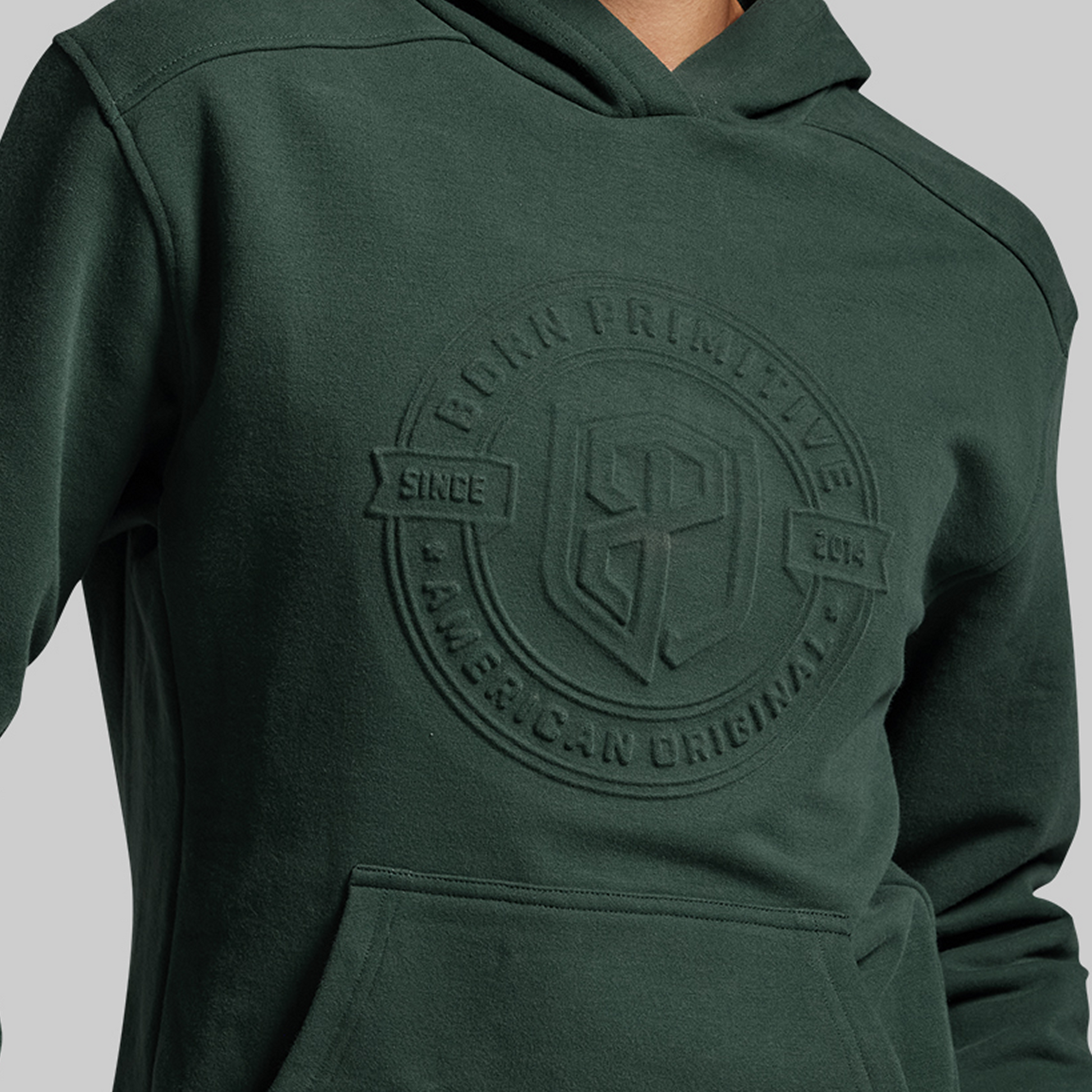 Green hoodie with a brand logo on a gray background