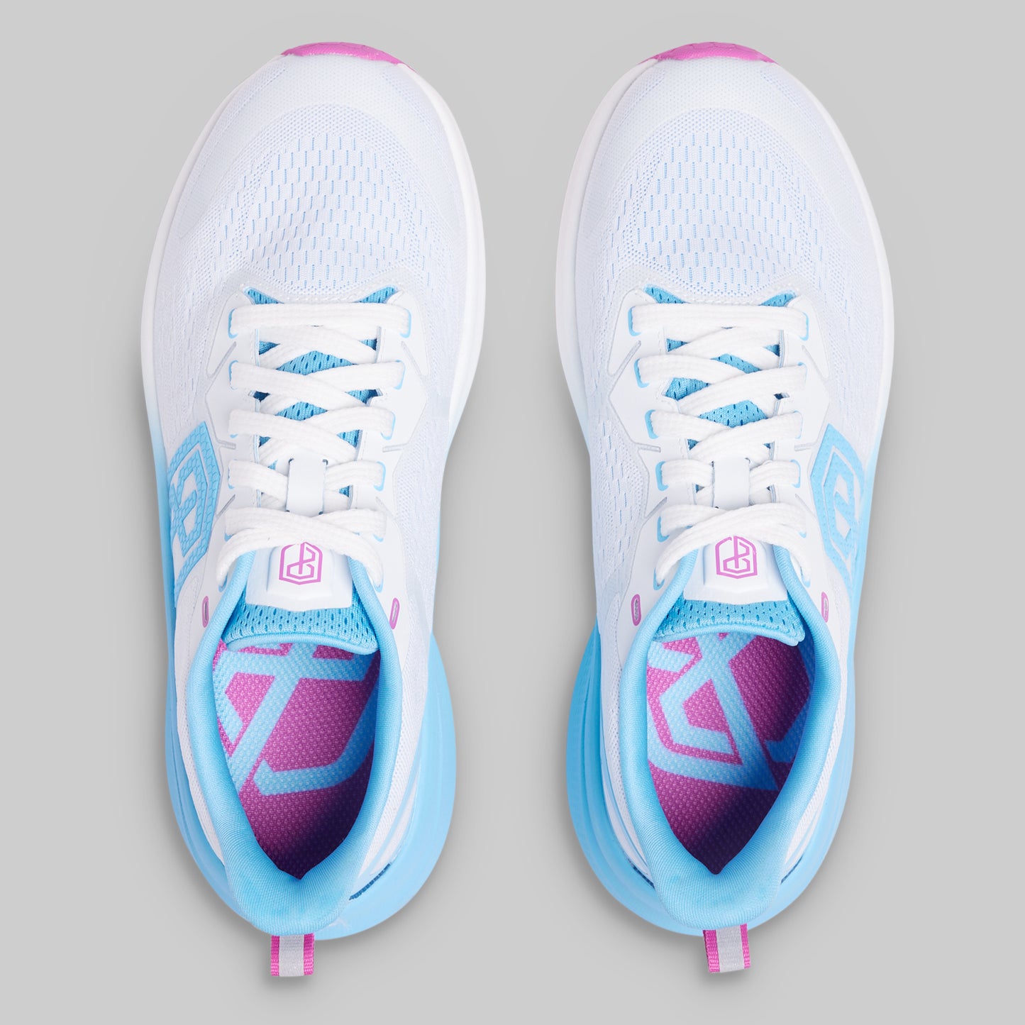 White running shoes with blue and pink accents on a gray background